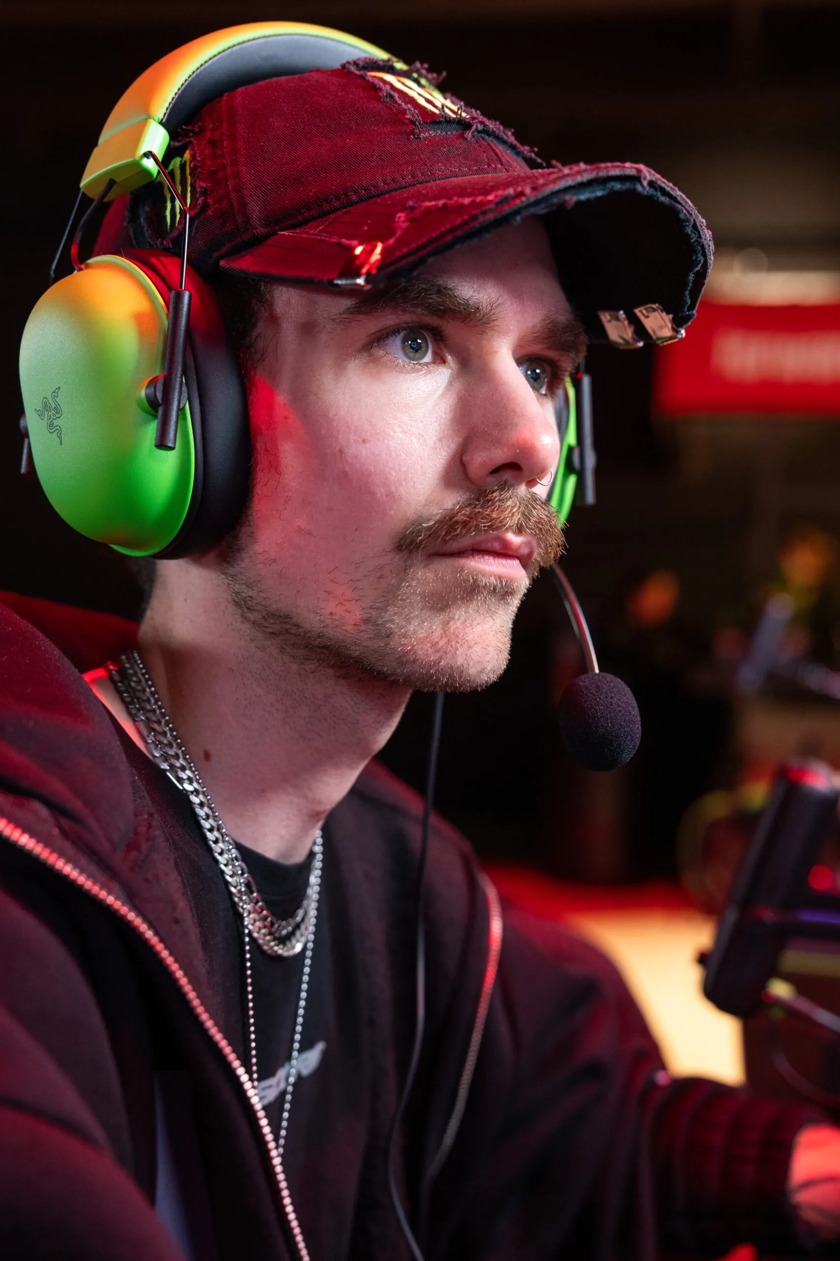 Esports player with headset focused on the game